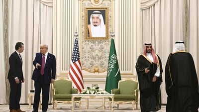 Saudi Crown Prince Mohammed bin Salman (C) speaks with an advisor as US President Donald Trump speaks with US Secretary of Defense Pete Hegseth (L) ahead of a bilateral meeting in Riyadh on May 13, 2025. Trump enjoyed a lavish, royal welcome in Saudi Arabia on the first state visit of his second term, with the US president foremost focused on business deals at the start of a Gulf tour. (Photo by Brendan SMIALOWSKI / AFP) (AFP) Saudi Crown Prince Mohammed bin Salman (C) speaks with an advisor as US President Donald Trump speaks with US Secretary of Defense Pete Hegseth (L) ahead of a bilateral meeting in Riyadh on May 13, 2025. Trump enjoyed a lavish, royal welcome in Saudi Arabia on the first state visit of his second term, with the US president foremost focused on business deals at the start of a Gulf tour. (Photo by Brendan SMIALOWSKI / AFP) (AFP)
