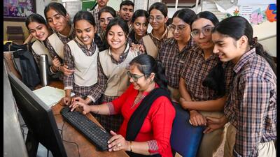 Students checking their result in computer after announced the Haryana Board of School Education (HBSE) class 12th result in Jiwan Jyoti Senior Secondary School Sector 4 near Gymkhana club on Tuesday. (Parveen Kumar/HT Photo) Students checking their result in computer after announced the Haryana Board of School Education (HBSE) class 12th result in Jiwan Jyoti Senior Secondary School Sector 4 near Gymkhana club on Tuesday. (Parveen Kumar/HT Photo)