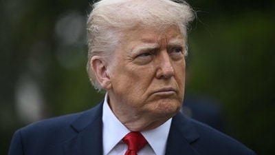 US President Donald Trump looks on as he hosts the annual Easter Egg Roll on the South Lawn (AFP) US President Donald Trump looks on as he hosts the annual Easter Egg Roll on the South Lawn (AFP)