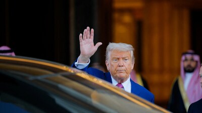 U.S. President Donald Trump gestures to reporters. (REUTERS)