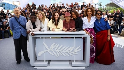 Juliette Binoche, Jury President of the 78th Cannes Film Festival and Jury members Carlos Reygadas, Payal Kapadia, Leila Slimani, Halle Berry, Jeremy Strong, Dieudo Hamadi, Alba Rohrwacher and Hong Sang-soo pose during a photocall before the opening ceremony of the 78th Cannes Film Festival in Cannes, France. (REUTERS/Stephane Mahe)