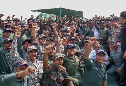 Security forces personnel at the Adampur air base rejoice and cheer on as PM Modi paid them a special visit on May 13. (HT Photo) Security forces personnel at the Adampur air base rejoice and cheer on as PM Modi paid them a special visit on May 13. (HT Photo)