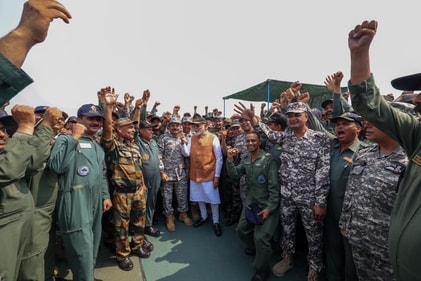 Happy faces of Modi and security forces personnel captured at Punjab's Adampur airbase, a day after the PM's address to the nation on Operation Sindoor. (HT Photo) Happy faces of Modi and security forces personnel captured at Punjab's Adampur airbase, a day after the PM's address to the nation on Operation Sindoor. (HT Photo)