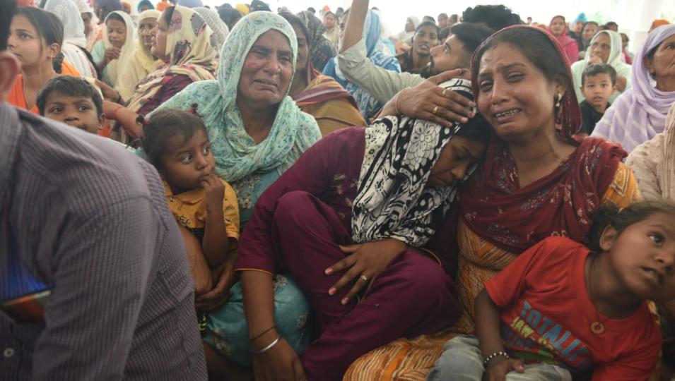 Family members of Karnail Singh, who was among the 17 villagers who died after consuming the spurious liquor, at Majitha on Tuesday. (Sameer Sehgal/HT) Family members of Karnail Singh, who was among the 17 villagers who died after consuming the spurious liquor, at Majitha on Tuesday. (Sameer Sehgal/HT)