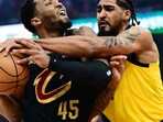 NBA playoff: Cleveland, Ohio, USA; Cleveland Cavaliers guard Donovan Mitchell (45) drives to the basket against Indiana Pacers forward Obi Toppin (1) during the first half of game five of the second round for the 2025 NBA Playoffs at Rocket Arena. Mandatory Credit: Ken Blaze-Imagn Images     TPX IMAGES OF THE DAY