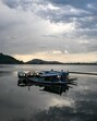 Empty boats are pictured in the Dal Lake in Srinagar on May 13, 2025. Three suspected rebels were killed in Indian-administered Kashmir on May 13 in a gun battle with soldiers, the army said, the first since an attack on tourists last month brought India and Pakistan to the brink of war. (Photo by Punit PARANJPE / AFP) (AFP)