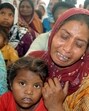 Grieving family members of one of the victims, Karnail Singh, at Threawal village in Amritsar on Tuesday. (Sameer Sehgal/HT)