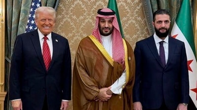 President Donald Trump, left, Saudi's Crown Prince Mohammed bin Salman, centre, and Syria's interim President Ahmad al-Sharaa, right, pose for a picture, in Riyadh, Saudi Arabia, Wednesday, May 14, 2025. (AP)