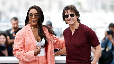 Angela Basset, who plays a pivotal role in the film stunned in a bright orange pantsuit for the photocall. She also joined star Tom Cruise for a few poses during a photocall for the film Mission: Impossible - The Final Reckoning. May 14, 2025. REUTERS/Benoit Tessier (REUTERS)