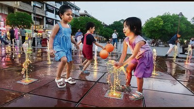 Children cooling off at the Sector 17 Plaza in Chandigarh on a hot day. (Keshav Singh/HT) Children cooling off at the Sector 17 Plaza in Chandigarh on a hot day. (Keshav Singh/HT)