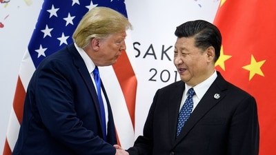 China's President Xi Jinping (R) shaking hands with US President Donald Trump before a bilateral meeting on the sidelines of the G20 Summit in Osaka. (File photo) (AFP) China's President Xi Jinping (R) shaking hands with US President Donald Trump before a bilateral meeting on the sidelines of the G20 Summit in Osaka. (File photo) (AFP)