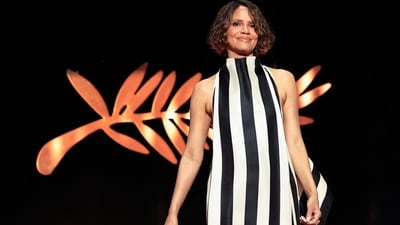 Halle Berry arrives on stage during the Opening Ceremony of the 78th edition of the Cannes Film Festival on May 13, 2025. (Photo by Valery HACHE / AFP) (AFP) Halle Berry arrives on stage during the Opening Ceremony of the 78th edition of the Cannes Film Festival on May 13, 2025. (Photo by Valery HACHE / AFP) (AFP)