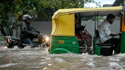 Hubballi city was flooded due to heavy rains. (Pic for representation) (AFP) Hubballi city was flooded due to heavy rains. (Pic for representation) (AFP)