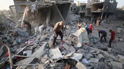 Palestinians inspect the site of an Israeli strike on a house, in Jabalia, in the northern Gaza Strip, May 14, 2025. REUTERS/Mahmoud Issa (REUTERS)