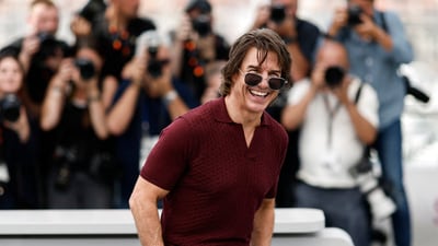 Tom Cruise drew loud cheers from the press as he posed during a photocall for the film Mission: Impossible - The Final Reckoning Out of competition at the 78th Cannes Film Festival. REUTERS/Benoit Tessier (REUTERS)