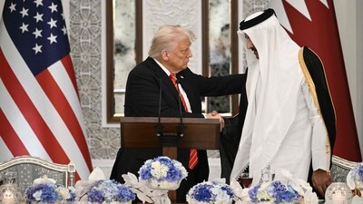 Qatar's Emir Sheikh Tamim bin Hamad al-Thani shakes the hand of the US President Donald Trump (L) at the start of a state dinner at the Lusail Palace in Doha on May 14, 2025. (AFP) Qatar's Emir Sheikh Tamim bin Hamad al-Thani shakes the hand of the US President Donald Trump (L) at the start of a state dinner at the Lusail Palace in Doha on May 14, 2025. (AFP)