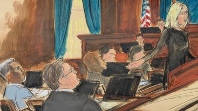 Assistant US Attorney Emily Johnson, right, gestures to Sean Diddy Combs, far left, while giving her opening statement the first day of trial at Manhattan federal court, Monday, May 12, 2025, in New York. (Elizabeth Williams via AP) (AP)