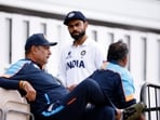 India's Virat Kohli along with the then-head coach Ravi Shastri and bowling coach Bharath Arun