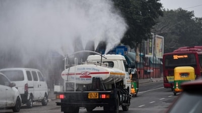 A truck-mounted sprinkler sprays tiny droplets of water to counter air pollution in Delhi (ANI) A truck-mounted sprinkler sprays tiny droplets of water to counter air pollution in Delhi (ANI)