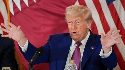 President Donald Trump gestures during a business roundtable in Doha. (AP) President Donald Trump gestures during a business roundtable in Doha. (AP)