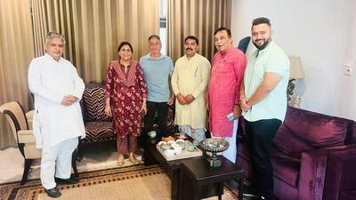 BJP district president Parveen Lather during his meeting with former two-time Karnal MLA Sumita Singh to invite her for Tiranga Yatra in Karnal.  (HT Photo)