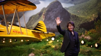 US actor Tom Cruise waves to the audience as he poses on the red carpet upon arrival for the Global Premiere of "Mission: Impossible - The Final Reckoning" at Leicester Square Gardens in central London, on May 15, 2025. (Photo by HENRY NICHOLLS / AFP) (AFP) US actor Tom Cruise waves to the audience as he poses on the red carpet upon arrival for the Global Premiere of "Mission: Impossible - The Final Reckoning" at Leicester Square Gardens in central London, on May 15, 2025. (Photo by HENRY NICHOLLS / AFP) (AFP)