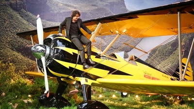 US actor Tom Cruise climbs down a plane as he poses on the red carpet upon arrival for the Global Premiere of "Mission: Impossible - The Final Reckoning" at Leicester Square Gardens in central London, on May 15, 2025. (Photo by HENRY NICHOLLS / AFP) (AFP) US actor Tom Cruise climbs down a plane as he poses on the red carpet upon arrival for the Global Premiere of "Mission: Impossible - The Final Reckoning" at Leicester Square Gardens in central London, on May 15, 2025. (Photo by HENRY NICHOLLS / AFP) (AFP)