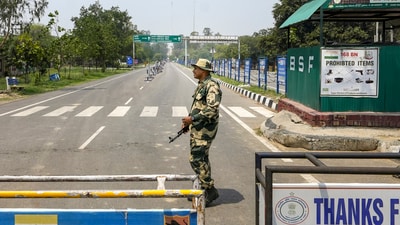 A Border Security Force (BSF) soldier stands guard near India-Pakistan border check post, near Amritsar, Sunday, May 11, 2025. (PTI) A Border Security Force (BSF) soldier stands guard near India-Pakistan border check post, near Amritsar, Sunday, May 11, 2025. (PTI)