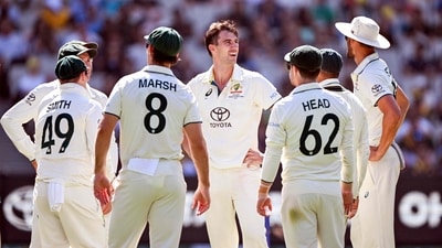 Australia's Pat Cummins (C) with teammates (AFP) Australia's Pat Cummins (C) with teammates (AFP)