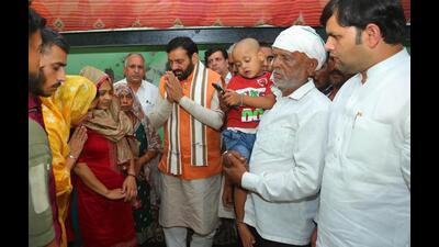Haryana chief minister Nayab Singh Saini met with deceased lance naik Dinesh Kumar Sharma’s family in Palwal on Thursday. (Sourced)