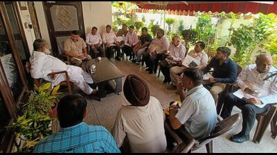 Haryana energy minister Anil Vij during a review meeting of development works with the officials of HSIIDC and other departments at his residence on Thursday. (HT Photo)
