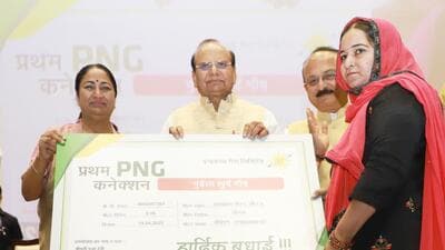 LG VK Saxena, chief minister Rekha Gupta with other leaders present the first PNG connection to a beneficiary during the launch of PNG connections in 111 villages of Delhi in Dwarka on Thursday. (HT Photo) LG VK Saxena, chief minister Rekha Gupta with other leaders present the first PNG connection to a beneficiary during the launch of PNG connections in 111 villages of Delhi in Dwarka on Thursday. (HT Photo)