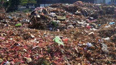 Ludhiana, India – April 05, 2025: A view of scattered garbage dump along with dry leaves at vacant land backside satpaul mittal school dugri in Ludhiana on Saturday, April 05, 2025. (Photo by Gurpreet Singh/Hindustan Times)