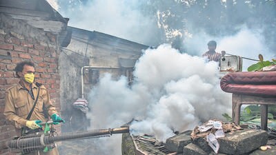 Mumbai, India - September 24, 2016: A BMC staffer conducts a fumigation near a well in a Mumbai locality. The BMC staff identify, treat and eliminate breeding of dengue transmitting Aedes mosquitoes which spreads in Mumbai, India, on Friday, September 24, 2016. (Photo by Satish Bate/ Hindustan Times) (Satish Bate/HT PHOTO) Mumbai, India - September 24, 2016: A BMC staffer conducts a fumigation near a well in a Mumbai locality. The BMC staff identify, treat and eliminate breeding of dengue transmitting Aedes mosquitoes which spreads in Mumbai, India, on Friday, September 24, 2016. (Photo by Satish Bate/ Hindustan Times) (Satish Bate/HT PHOTO)