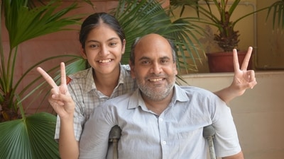 Srishti Sharma celebrating her success with her father, Rajiv Sharma. (Sant Arora/HT) Srishti Sharma celebrating her success with her father, Rajiv Sharma. (Sant Arora/HT)
