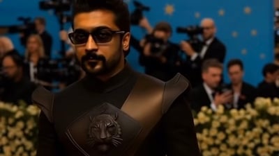 Suriya looked like a desi superhero in an all-black structured outfit with a tiger emblem. (Instagram: Jayprints) Suriya looked like a desi superhero in an all-black structured outfit with a tiger emblem. (Instagram: Jayprints)