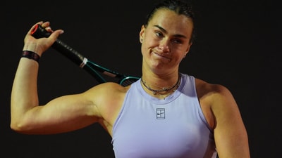 Aryna Sabalenka reacts during her quarterfinal loss to Zheng Qinwen in Rome. (REUTERS)