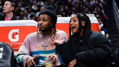 Rapper DDG, left, and singer Halle Bailey watch during the second half of an NBA basketball game between the Los Angeles Clippers and the Golden State Warriors, Thursday, Dec. 14, 2023, in Los Angeles. (AP Photo/Ryan Sun) (AP) Rapper DDG, left, and singer Halle Bailey watch during the second half of an NBA basketball game between the Los Angeles Clippers and the Golden State Warriors, Thursday, Dec. 14, 2023, in Los Angeles. (AP Photo/Ryan Sun) (AP)