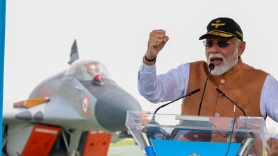 Prime Minister Narendra Modi at Adampur air base with MiG-29 fighter in the backdrop. Prime Minister Narendra Modi at Adampur air base with MiG-29 fighter in the backdrop.