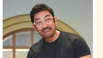 Aamir Khan has made headlines for two reasons in the recent months: his upcoming movie Sitare Zameen Par and the proposed redevelopment of his housing society in Mumbai. (HT Files) Aamir Khan has made headlines for two reasons in the recent months: his upcoming movie Sitare Zameen Par and the proposed redevelopment of his housing society in Mumbai. (HT Files)