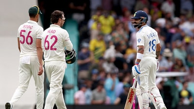 Virat Kohli, right, has a word with Mitchell Starc and Travis Head during the 5th Test match in Sydney (AFP) Virat Kohli, right, has a word with Mitchell Starc and Travis Head during the 5th Test match in Sydney (AFP)