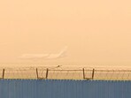 Layer of Dust cover IGI Airport Runway in the morning , in New Delhi, India, on Thursday, May 15, 2025. Layer of Dust cover IGI Airport Runway in the morning , in New Delhi, India, on Thursday, May 15, 2025.