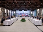 Russian delegation (R) and Ukrainian delegation (L) attending a meeting for Ukraine-Russia peace talks at the Turkish Presidential office Dolmabahce, in Istanbul.
