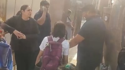 Four male and two female bouncers were seen vetting students at the entrance of Delhi Public School in Dwarka. (HT Photo) Four male and two female bouncers were seen vetting students at the entrance of Delhi Public School in Dwarka. (HT Photo)
