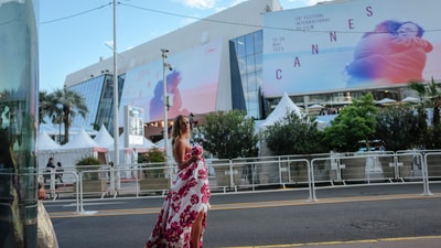 A person walks past the Palais des Festivals during the 78th international film festival in Cannes, southern France, Thursday, May 15, 2025. (Photo by Lewis Joly/Invision/AP) (Lewis Joly/Invision/AP) A person walks past the Palais des Festivals during the 78th international film festival in Cannes, southern France, Thursday, May 15, 2025. (Photo by Lewis Joly/Invision/AP) (Lewis Joly/Invision/AP)