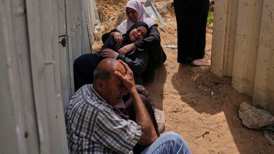 Palestinians mourn their relatives who were killed in Israeli airstrikes on a medical center in Jabalia, northern Gaza Strip, on Thursday. (AP) Palestinians mourn their relatives who were killed in Israeli airstrikes on a medical center in Jabalia, northern Gaza Strip, on Thursday. (AP)