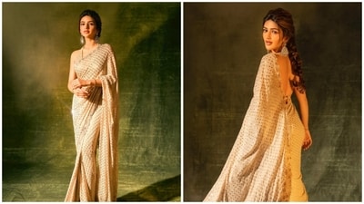 Sreeleela looked ethereal in a golden ivory chiffon saree by Dolly J, beautifully adorned with a pearl-embroidered border. She paired it with a bold halter-neck blouse, blending tradition with modern chic. Sreeleela looked ethereal in a golden ivory chiffon saree by Dolly J, beautifully adorned with a pearl-embroidered border. She paired it with a bold halter-neck blouse, blending tradition with modern chic.