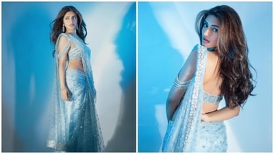 Sreeleela looked angelic in a frosty blue saree embellished with intricate detailing, paired with a strappy matching blouse. Delicate drop earrings and flawless makeup added charm to her ethnic look. Sreeleela looked angelic in a frosty blue saree embellished with intricate detailing, paired with a strappy matching blouse. Delicate drop earrings and flawless makeup added charm to her ethnic look.