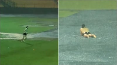 Tim David enjoys the rain in Bengaluru (RCB/X) Tim David enjoys the rain in Bengaluru (RCB/X)