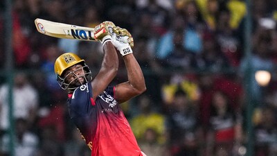 Romario Shepherd played a statement innings of 53*(14) for RCB vs CSK. (PTI) Romario Shepherd played a statement innings of 53*(14) for RCB vs CSK. (PTI)